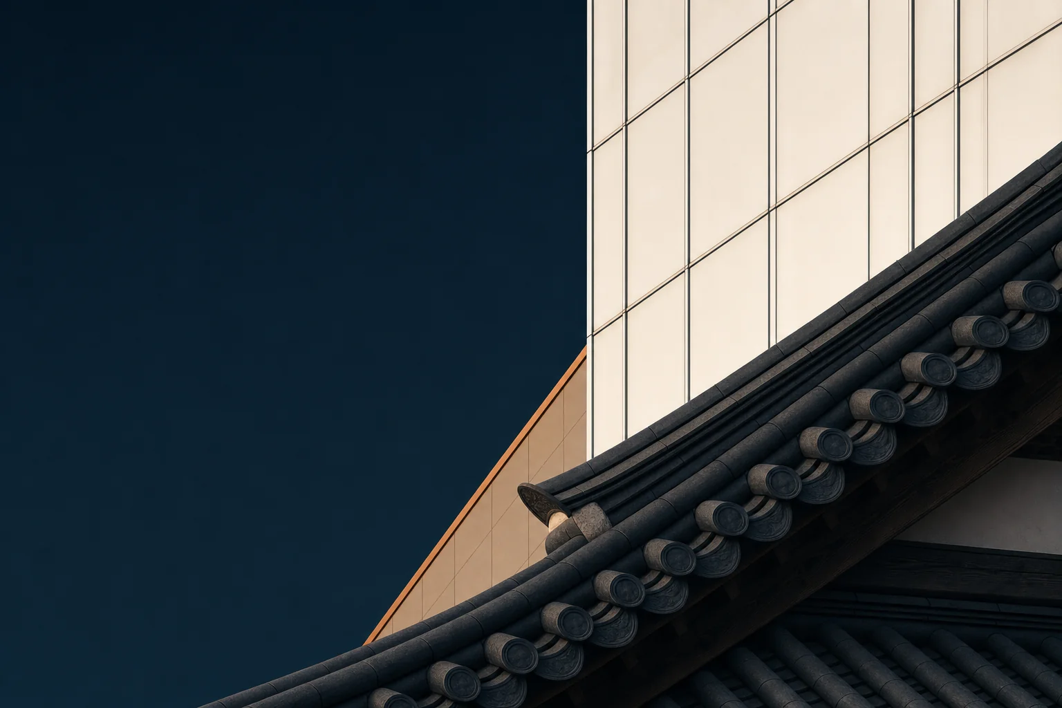 The tiled ridge of a hanok roof meeting the ivory grid of a modern curtain-wall facade